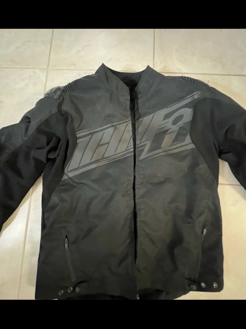 ICON Men's Black Performance Motorcycle Jacket with Tonal Logo